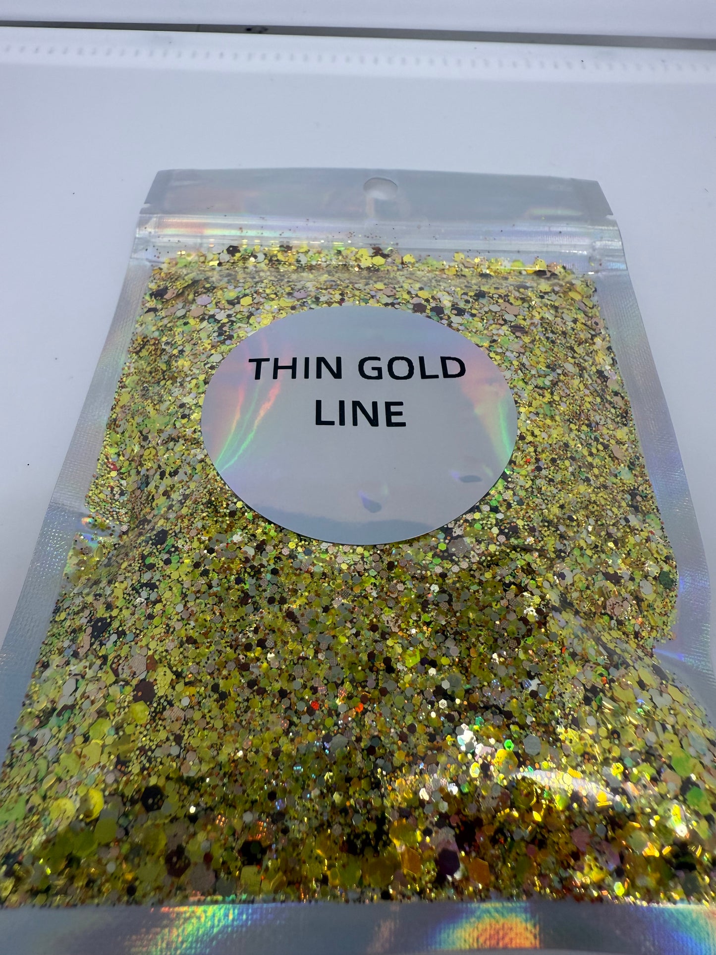 Thin Gold Line* GLOW